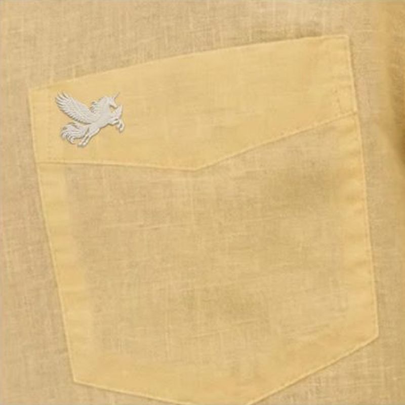 The unicorn embroidered in tone on textured linen