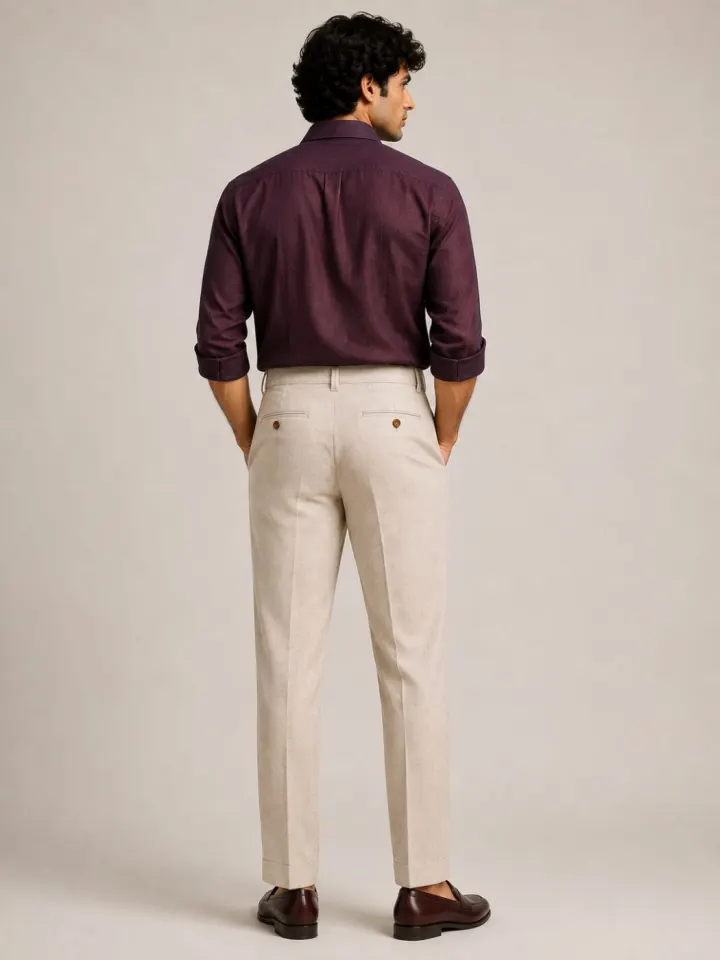 Bemount Arden Stone Pleated Linen Trouser, back view in Stone